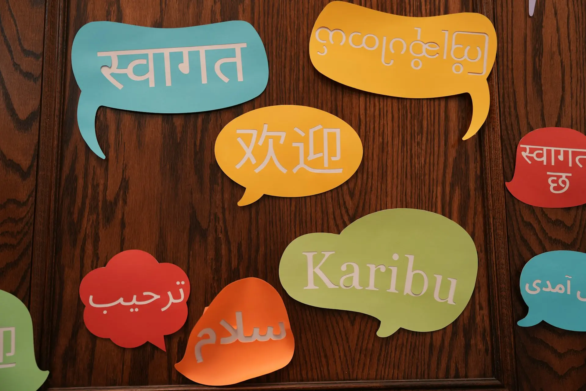 Designs in Every Language Your Customer Understands Poster design in Japanese, Arabic, Hindi, and French