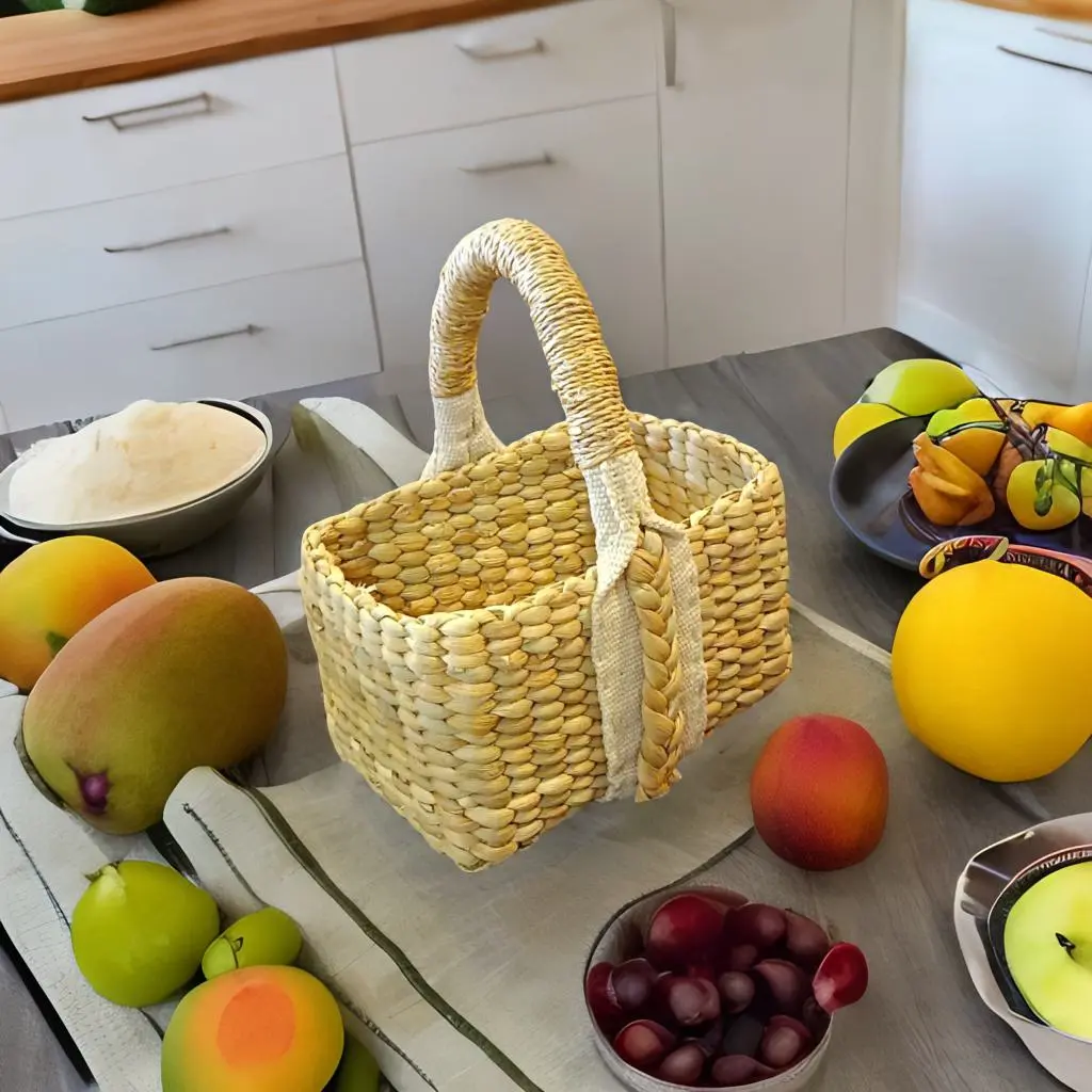Artisan weaving a handcrafted small water hyacinth basket bag – eco-friendly product from India