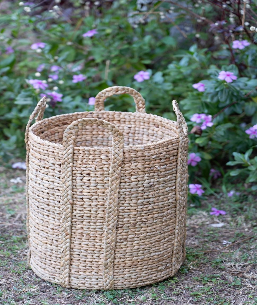 Large handwoven water hyacinth laundry basket with four sturdy handles – sustainable storage from India